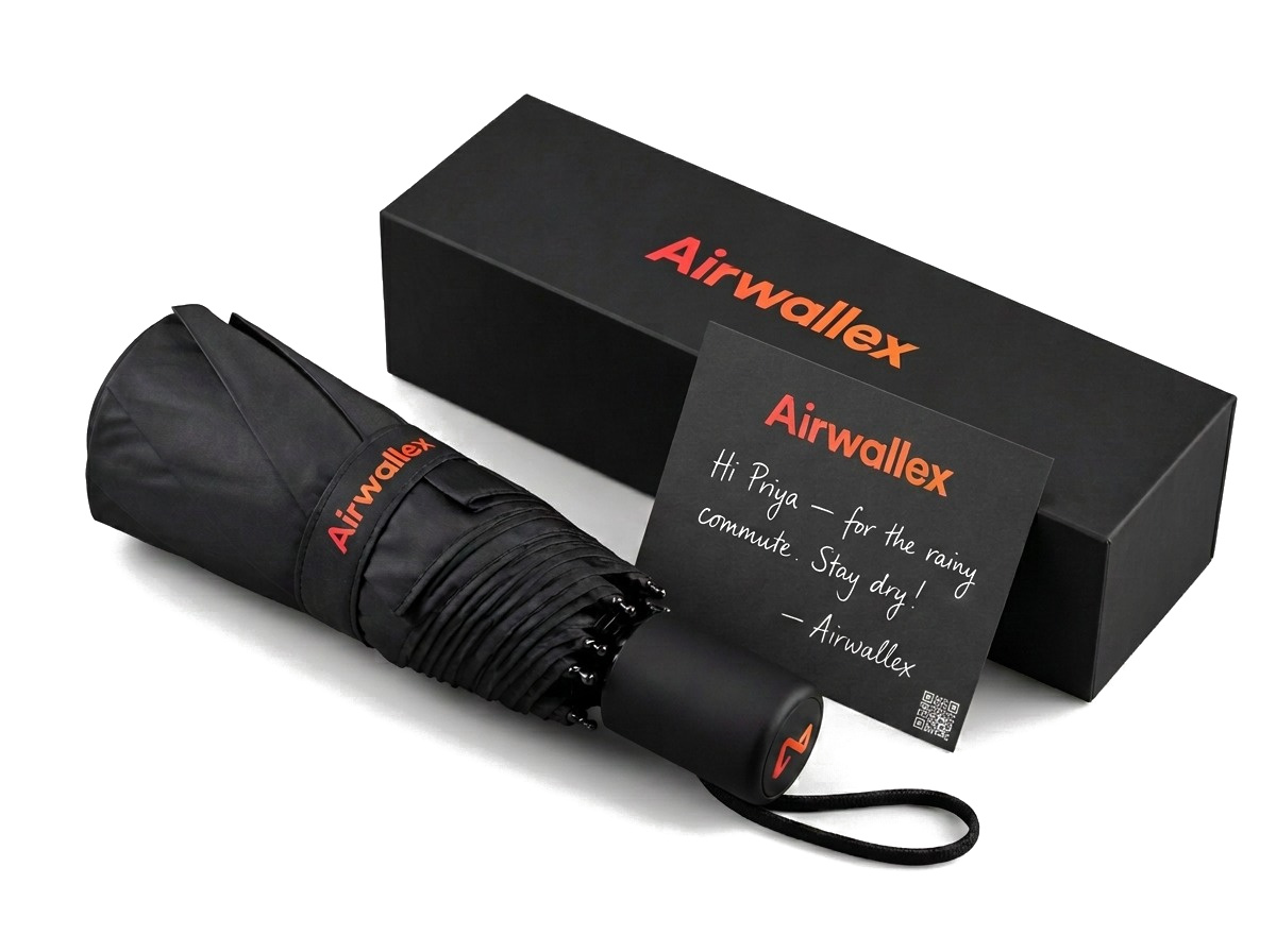 Branded compact umbrella with matching packaging and handwritten note